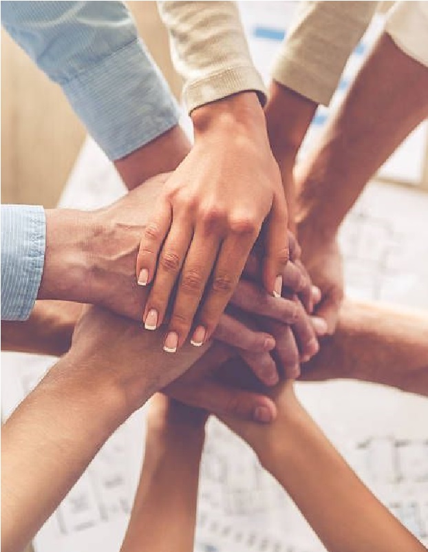 Top view of business people holding hands together, cropped